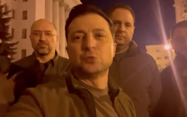 Ukraine President Volodymyr Zelensky posts a video of himself and his team outside the presidential headquarters in Kyiv on February 25, 2022. (Screen capture/Twitter)