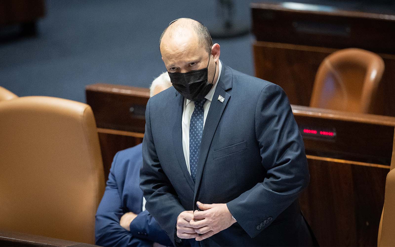 Prime Minister Naftali Bennett in the Knesset in Jerusalem, February 7, 2022. (Yonatan Sindel/Flash90)
