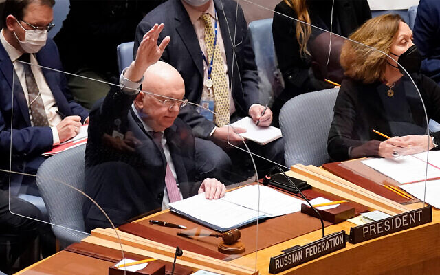 Russia's UN Ambassador Russia Vasily Nebenzya casts a lone dissenting vote in the United Nations Security Council, February 25, 2022. (AP Photo/Seth Wenig)