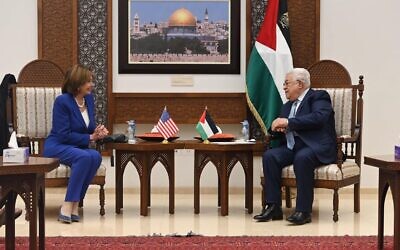 Palestinian Authority President Mahmoud Abbas (R) speaks with US House Speaker Nancy Pelosi in Ramallah, West Bank, on February, 17, 2022. (WAFA)