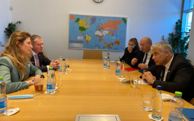 Foreign Minister Yair Lapid (1st from right right) meets Ukraine's First Deputy Foreign Minister Emine Dzhaparova (first from left) in Jerusalem on February 13, 2022. (courtesy)