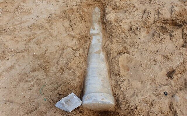 1,500-year-old marble pillar discovered on the beach near the Ashdod-Yam archaeological site. (Israel Antiquities Authority)