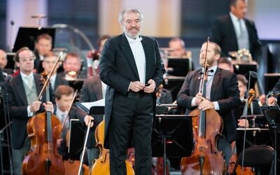 In this file photo taken on September 18, 2020, Russian conductor Valery Gergiev performs on stage with the Vienna Philharmonic Orchestra during the Summer Night Concert at Schoenbrunn Palace in Vienna, Austria, on September 18, 2020. The Munich Philharmonic on March 1, 2022, said it was parting ways with star Russian conductor Valery Gergiev 'with immediate effect' after he failed to respond to a request to denounce Moscow's invasion of Ukraine. (Georg Hochmuth/Pool/AFP)