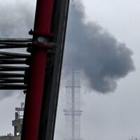 Smoke billows over Kyiv after a missile attack targeting the Ukrainian capital's television tower in Kyiv on March 1, 2022. (ARIS MESSINIS / AFP)