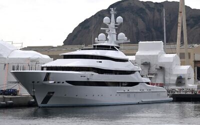 A picture taken on March 3, 2022 in a shipyard of La Ciotat, near Marseille, southern France, shows a yacht, Amore Vero, owned by a company linked to Igor Sechin, chief executive of Russian energy giant Rosneft. (Photo by Nicolas Tucat / AFP)