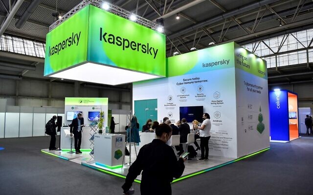 (FILES) This file photo taken on February 28, 2022 shows the stand of Russian antivirus software development company Kaspersky on the opening day of the MWC (Mobile World Congress) in Barcelona, Spain. - German cyber security agency BSI on March 15, 2022 urged consumers not to use anti-virus software made by Russia's Kaspersky, warning the firm could be implicated in hacking assaults amid Russia's war in Ukraine. (Photo by Pau BARRENA / AFP)