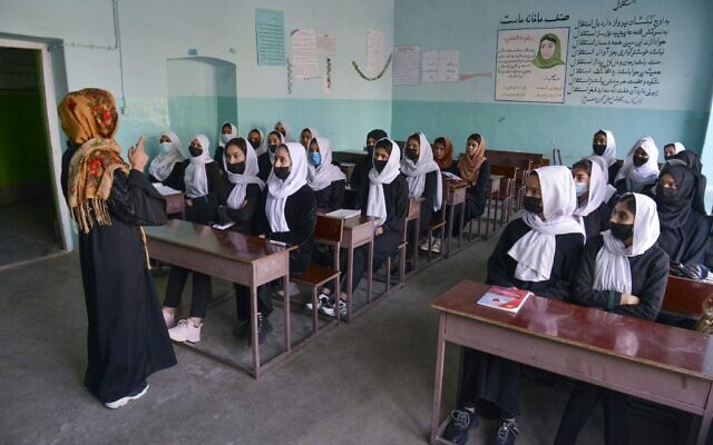 Girls attend a class after their school reopened in Kabul, Afghanistan, on March 23, 2022. (Ahmad SAHEL ARMAN / AFP)