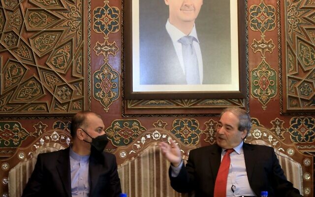 Iran's Foreign Minister Hossein Amir-Abdollahian (L) meets with his Syrian counterpart Faisal Mekdad in Damascus on March 23, 2022. (Louai Beshara / AFP) Iran's Foreign Minister Hossein Amir-Abdollahian (L) meets with his Syrian counterpart Faisal Mekdad in Damascus on March 23, 2022. (Louai Beshara / AFP)