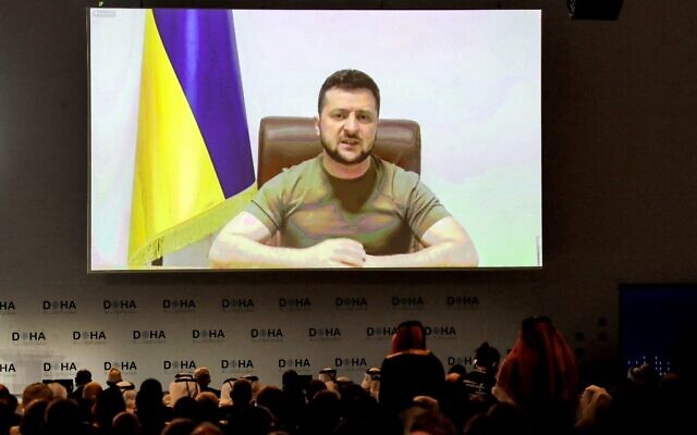 Ukraine's President Volodymyr Zelensky remotely addresses by video-link the Doha Forum in Qatar's capital on March 26, 2022 (KARIM JAAFAR / AFP)