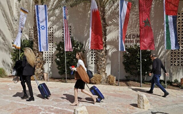 Attendees arrive at the Kedma hotel ahead of the Negev Summit, at Sde Boker in southern Israel on March 27, 2022. (Jack Guez/AFP)