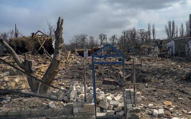 Destroyed homes attacked by Russian forces are pictured in the village of Bachtanka near Mykolaiv, a key city on the road to Odessa, Ukraine's biggest port on March 27, 2022. (BULENT KILIC / AFP)