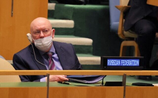 Permanent Representative of Russia to the United Nations Vasily Nebenzia reacts to the results of a General Assembly vote on a resolution is shown on a screen during a special session of the General Assembly at the United Nations headquarters on March 2, 2022 in New York City. (Michael M. Santiago / GETTY IMAGES NORTH AMERICA / Getty Images via AFP)