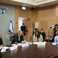 From left, Diaspora Affairs Minister Nachman Shai, Knesset Member Gilad Kariv, Immigration and Absorption Minister Pnina Tamano-Shata, and Immigration and Absorption Ministry Director-General Ronen Cohen speak at the Knesset's Constitution, Law and Justice Committee on February 28, 2022. (Noam Moskowitz/Knesset)