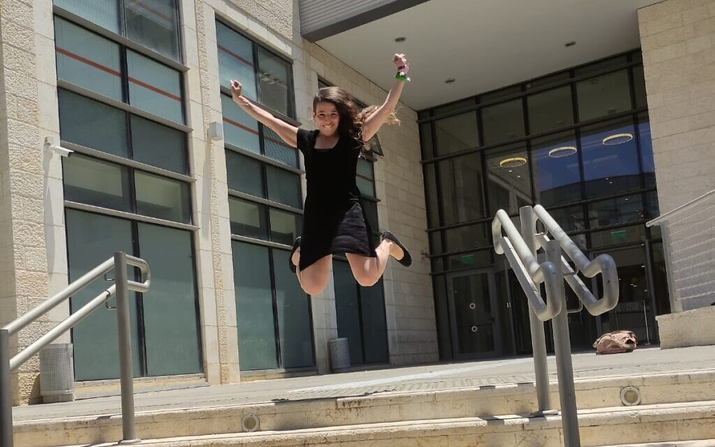 Esty Sompo jumps for joy after her former husband agreed to give her a ritual Jewish divorce on June 24, 2021. (Courtesy)