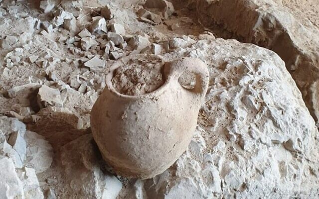 The ancient clay jug discovered by Robbie and his friend in cave 53 in the Qumran region, February 2022. (Amir Ganor/Israel Antiquities Authority)