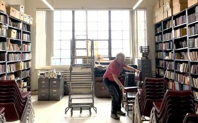 Yiddish actor Hy Wolfe runs CYCO, the Yiddish Book Center in Long Island City, Queens. (Julia Gergely/ JTA)