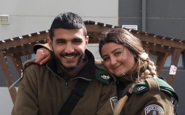 Yazan Falah and Shirel Aboukrat, two Border Police officers killed in a terror attack in Hadera, are seen at their base near the West Bank settlement of Bet El, hours before they were killed on March 27, 2022. (Israel Police)