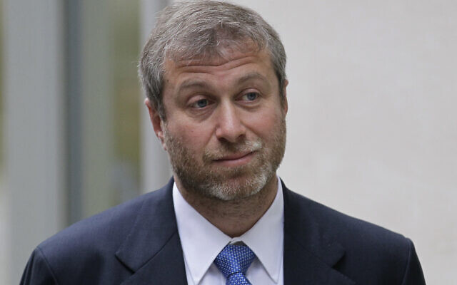 Russian tycoon Roman Abramovich, owner of England's Chelsea Football Club, leaves the high court in London for a lunch break, Monday, Oct. 31, 2011. (AP Photo/Sang Tan)
