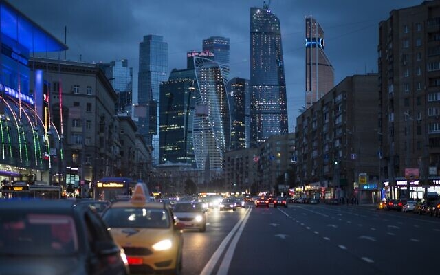 Illustrative: Traffic moves along the multi-lane highway in Moscow, with the modern city skyscrapers illuminating the skyline in Moscow, Russia, on July 8, 2016.  (AP Photo/Alexander Zemlianichenko)