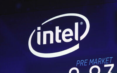 In this Oct. 3, 2018, file photo the Intel logo appears on a screen at the Nasdaq MarketSite, in New York's Times Square. (AP/Richard Drew)
