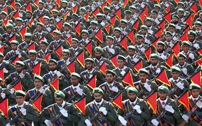 In this September 21, 2016, file photo, Iran’s Revolutionary Guard troops march in a military parade in Tehran, Iran. ​(AP Photo/Ebrahim Noroozi, File)