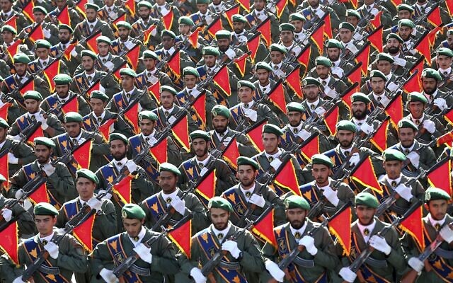 n this September 21, 2016, file photo, Iran’s Revolutionary Guard troops march in a military parade in Tehran, Iran. (AP Photo/Ebrahim Noroozi, File)