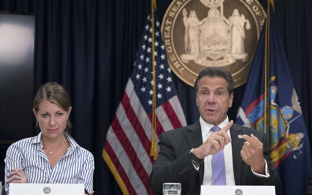 Then-secretary to the governor Melissa DeRosa, left, joins then-New York governor Andrew Cuomo as he speaks to reporters during a news conference in New York, September 14, 2018. (Mary Altaffer/AP/File)