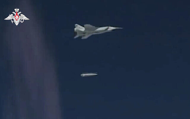 This photo taken from video provided by the Russian Defense Ministry Press Service Feb. 19, 2022, shows a MiG-31K fighter of the Russian air force dropping a Kinzhal hypersonic cruise missile during a military drills. (Russian Defense Ministry Press Service via AP)