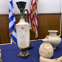 Stolen antiquities, seized from collector and billionaire hedge fund founder Michael Steinhardt, are displayed at a news conference at the offices of the Manhattan District Attorney Alvin Bragg in New York, Feb. 23, 2022. (David R. Martin/AP)