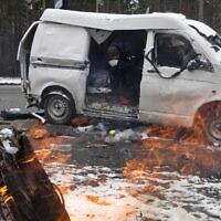 A man reacts inside a vehicle damaged by shelling, in Brovary, outside Kyiv, Ukraine, on March 1, 2022. (AP Photo/Efrem Lukatsky)