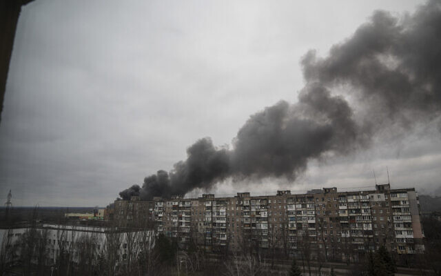 Smoke rise after shelling by Russian forces in Mariupol, Ukraine, on March 4, 2022. (AP Photo/Evgeniy Maloletka)