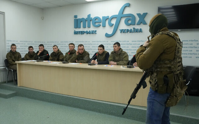 Captured Russian soldiers answer media questions at a press conference in the Interfax news agency in Kyiv, Ukraine, March 5, 2022. (Efrem Lukatsky/AP)