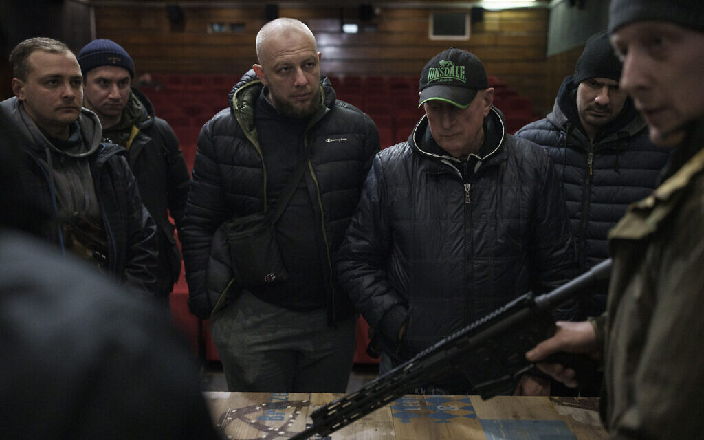 Ukrainian civilians receive weapons training inside a cinema in Lviv, western Ukraine, March 5, 2022. (AP Photo/Felipe Dana)