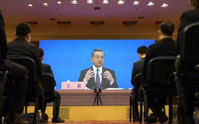 Chinese Foreign Minister Wang Yi speaks during a remote video press conference held on the sidelines of the annual meeting of China's National People's Congress (NPC) in Beijing, on March 7, 2022 (AP Photo/ Sam McNeil)