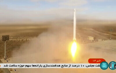 This image taken from video footage aired by Iranian state television on March 8, 2022, shows the launch of a rocket by Iran's Revolutionary Guard carrying a Noor-2 satellite in northeastern Shahroud Desert, Iran. (Iranian state television via AP)