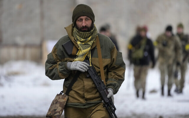 A Belarusian volunteer receives military training at the Belarusian Company base in Kyiv, Ukraine, March 8, 2022. (AP Photo/Efrem Lukatsky)
