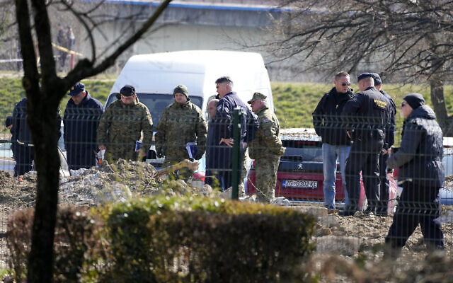 Police inspect site of a drone crash in Zagreb, Croatia, on March 11, 2022. (AP Photo/Darko Bandic)