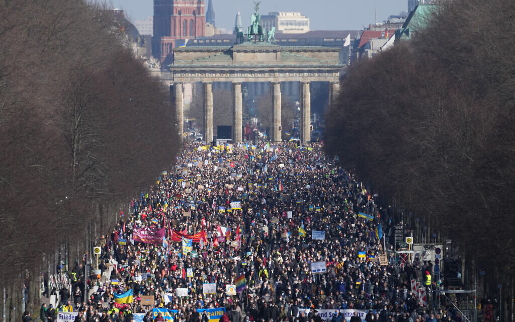 People attend a pro-Ukraine protest rally in Berlin, Germany, March 13, 2022. (AP Photo/Michael Sohn)