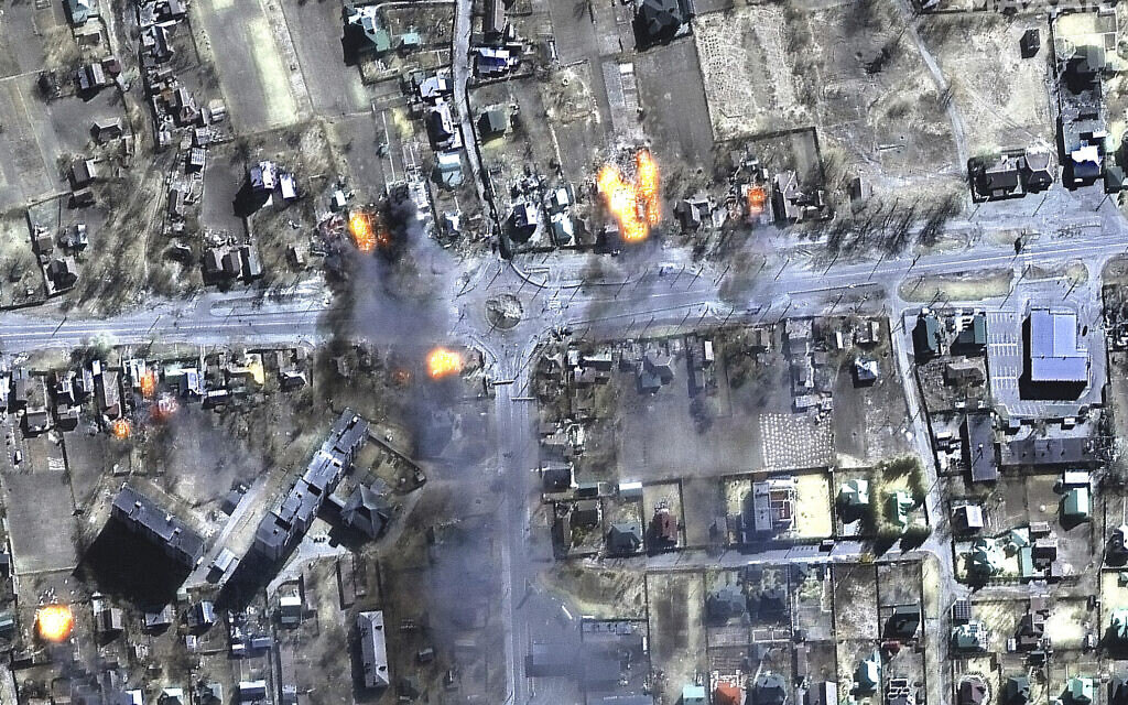 This satellite image provided by Maxar Technologies shows burning buildings in a residential area in northeast Chernihiv, Ukraine, on March 16, 2022. (Maxar Technologies via AP)