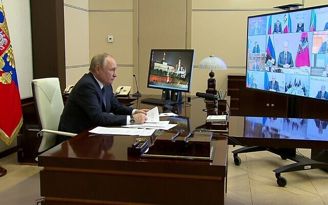 Russian President Vladimir Putin holds a video conference, March 16, 2022, at the Novo-Ogaryovo residence, outside Moscow. (Russian Presidential Press Service via AP)