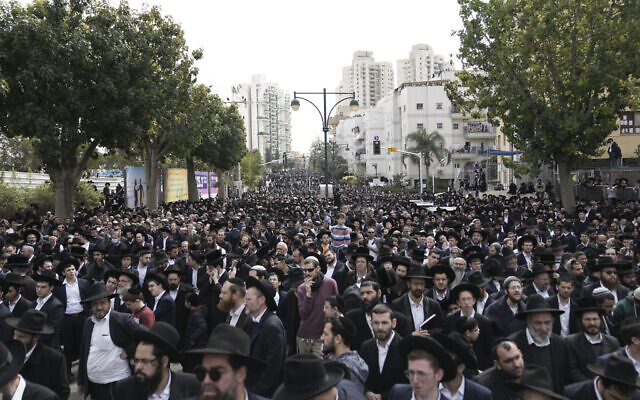 Ultra-Orthodox Jews attend the funeral of Rabbi Chaim Kanievsky in Bnei Brak, March 20, 2022. (AP Photo/Oded Balilty)
