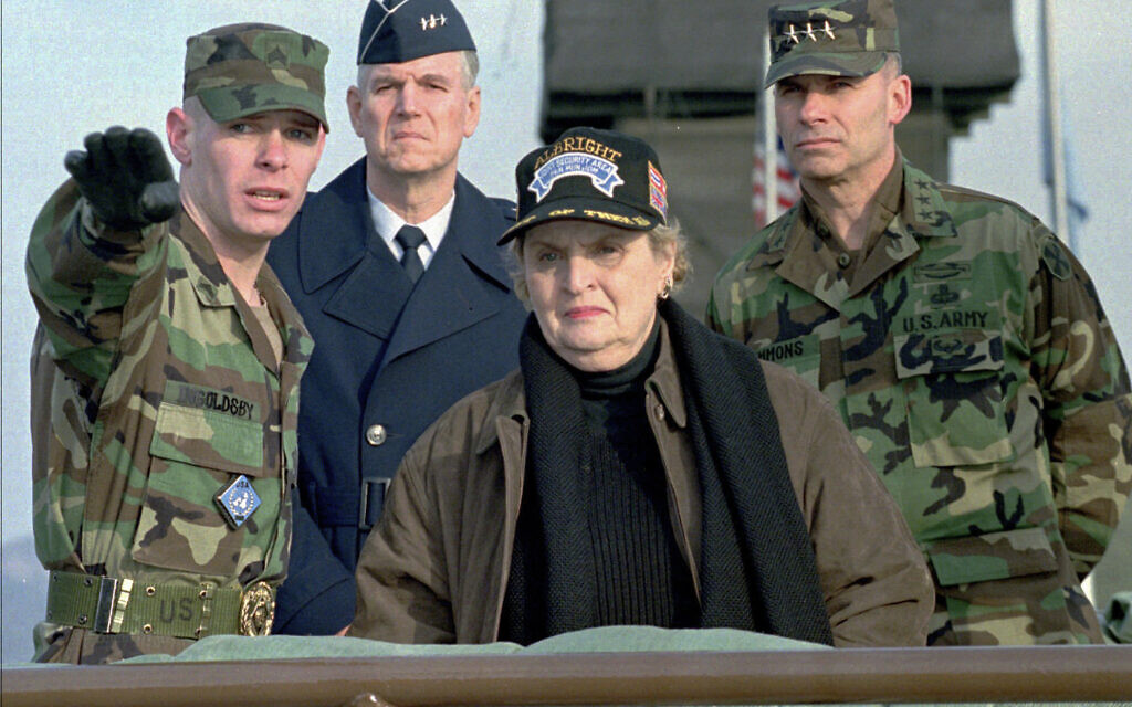 Then-US Secretary of State Madeleine Albright, center, gets a briefing on the situation around the border between two Koreas during her visit to guard post Ouelletle in the border village of the Panmunjom, north of Seoul, Feb. 22, 1997. (AP Photo)