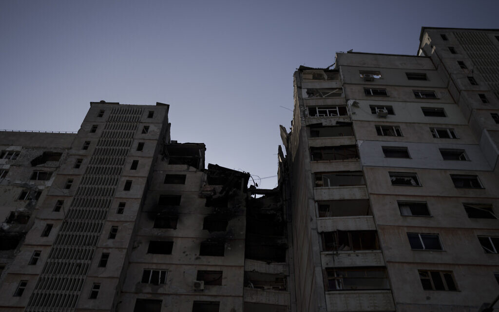 A view of the damage to a residential building after Russian strikes in Kharkiv, Ukraine, Thursday, March 24, 2022. (AP/Felipe Dana)