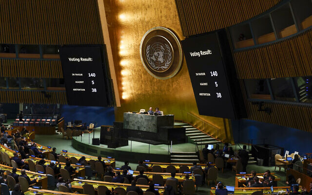 Screens display the results of a vote on a resolution regarding the war in Ukraine at United Nations headquarters, on March 24, 2022. (AP Photo/Seth Wenig)