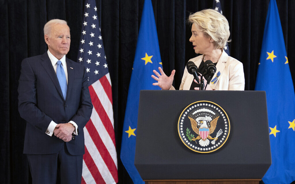 US President Joe Biden listens as European Commission President Ursula von der Leyen speaks about the Russian invasion of Ukraine, at the US Mission in Brussels, Friday, March 25, 2022, in Brussels. (AP Photo/Evan Vucci)