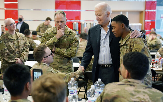 President Joe Biden visits with members of the 82nd Airborne Division at the G2A Arena, on Friday, March 25, 2022, in Jasionka, Poland. (AP Photo/Evan Vucci)