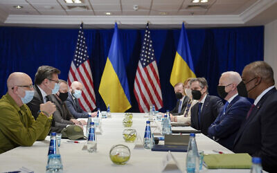 US President Joe Biden participates in a meeting with Ukrainian Foreign Minister Dmytro Kuleba, second from left, and Ukrainian Defense Minister Oleksii Reznikov, left, on Saturday, March 26, 2022, in Warsaw. Defense Secretary Lloyd Austin, right, and Secretary of State Antony Blinken, third from right, look on. (AP/Evan Vucci)