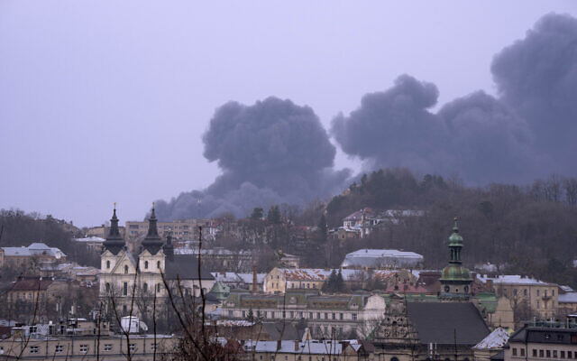 Smoke rises the air in Lviv, western Ukraine, Saturday, March 26, 2022. With Russia continuing to strike and encircle urban populations, from Chernihiv and Kharkiv in the north to Mariupol in the south, Ukrainian authorities said Saturday that they cannot trust statements from the Russian military Friday suggesting that the Kremlin planned to concentrate its remaining strength on wresting the entirety of Ukraine's eastern Donbas region from Ukrainian control. (AP Photo/Nariman El-Mofty)