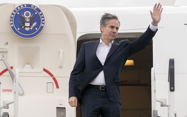 US Secretary of State Antony Blinken waves as he boards his plane in Warsaw, Poland, on March 26, 2022, en route to Israel. (AP Photo/Jacquelyn Martin, Pool)
