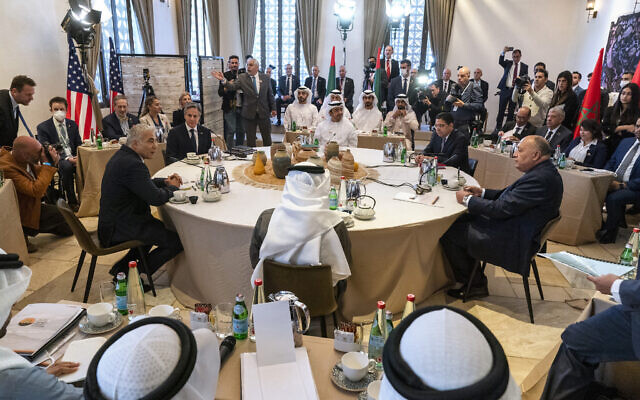 The opening roundtable begins at the Negev Summit, as Foreign Minister Yair Lapid, clockwise from left, makes opening remarks with US Secretary of State Antony Blinken, United Arab Emirates' Foreign Minister Sheikh Abdullah bin Zayed Al Nahyan, Morocco's Foreign Minister Nasser Bourita, Egypt's Foreign Minister Sameh Shoukry, and Bahrain's Foreign Minister Abdullatif bin Rashid al-Zayani, March 28, 2022, in Sde Boker. (AP Photo/Jacquelyn Martin, Pool)